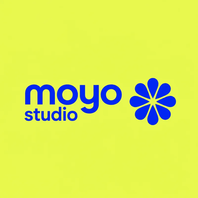 Moyo Studio blue wordmark and flower on yellow